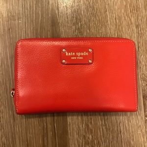 Kate Spade leather multi-pocket clutch